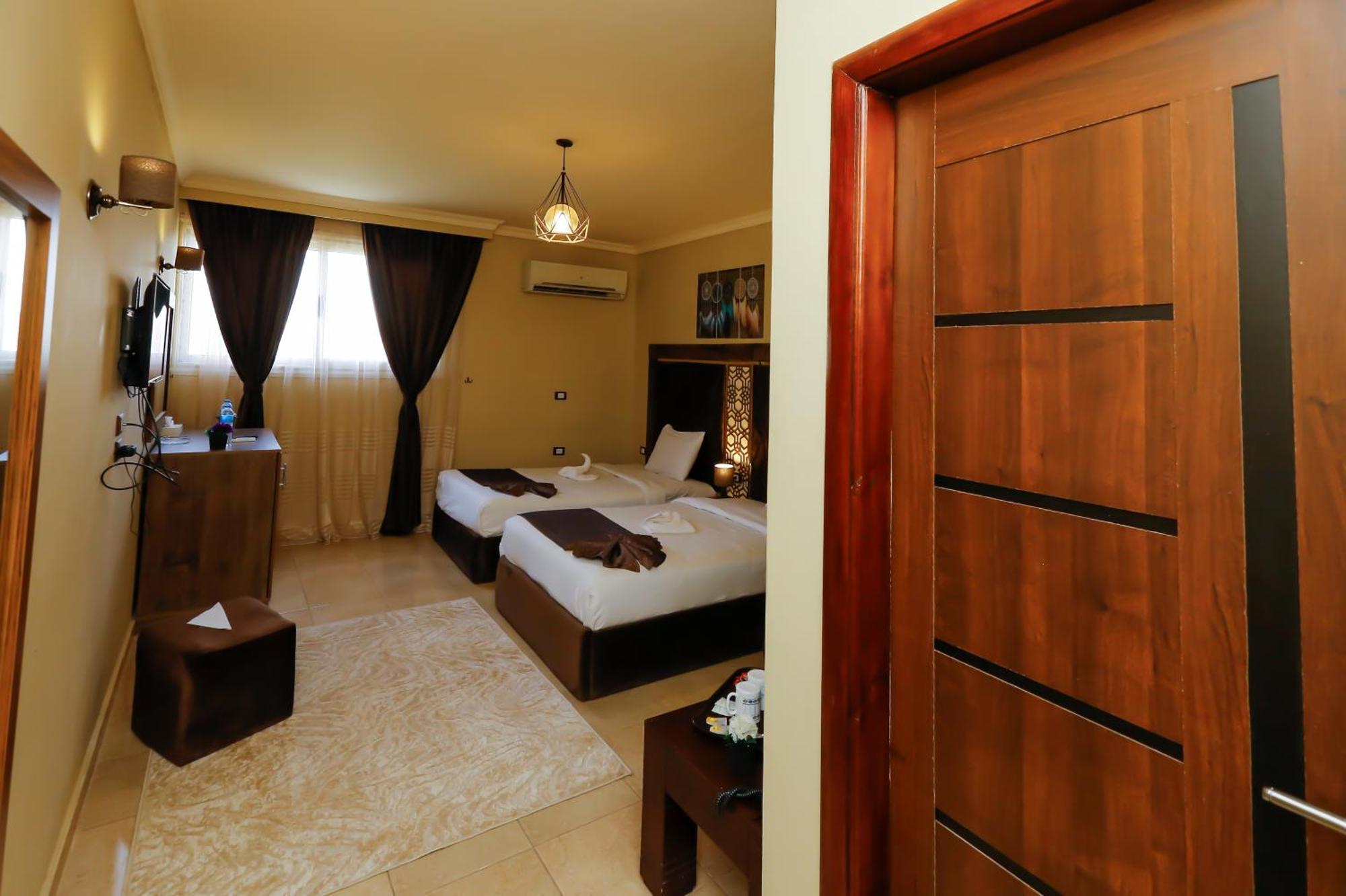 Master Pyramids Hotel Al Kawm al Akhdar 外观 照片